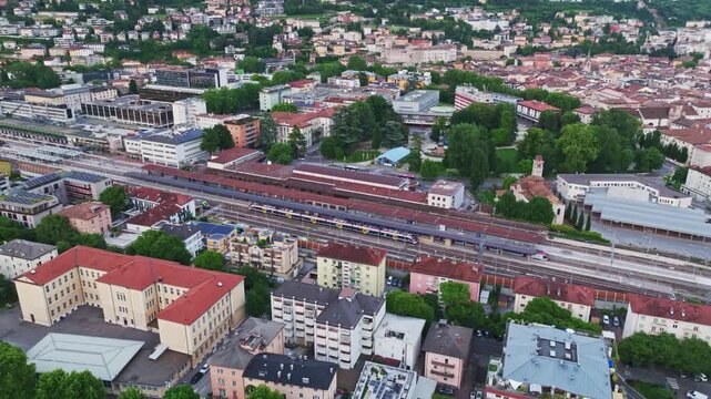Aerial drone view of Trento main train station, Italy.