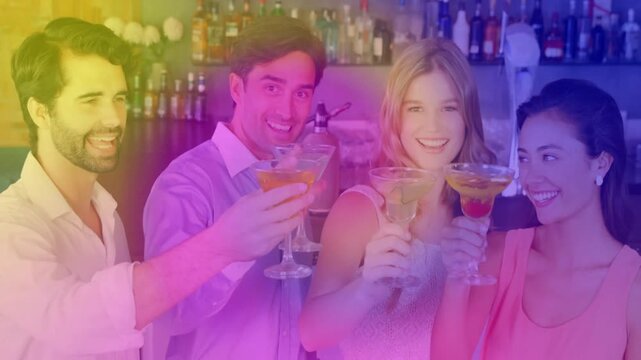 Four friends celebrating by raising drinks to camera in bar, gradient overlay sweeping across faces