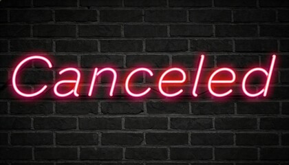 Obraz premium Glowing pink neon sign reading Canceled casting magenta halo on dark brick wall, with clips