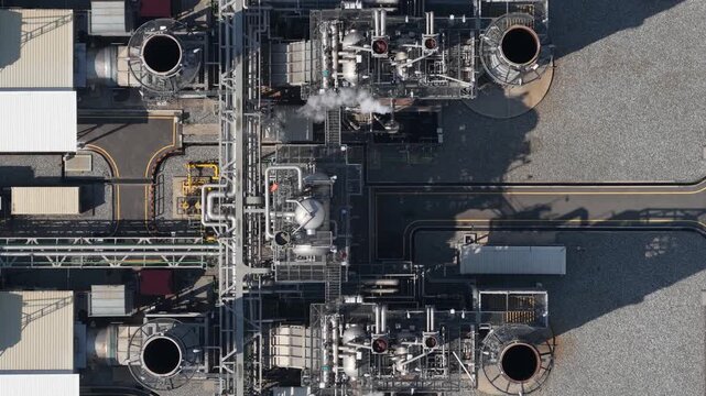 Aerial top down view of natural gas power plant generating electricity