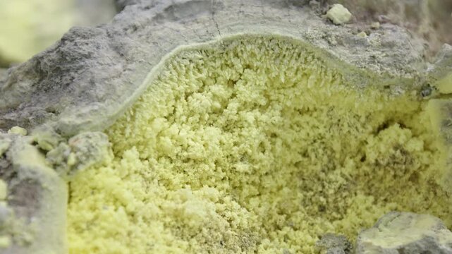 Close up view of the sulfur on the volcano of Mendeleev on Kunashir island. Russia
