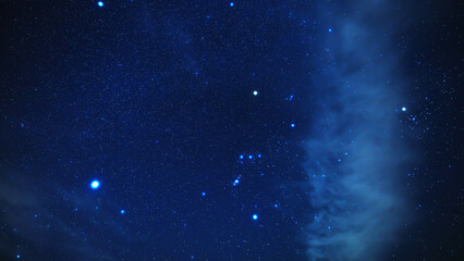 Fototapeta premium Orion constellation and Milky Way stars on a dark countryside skies.