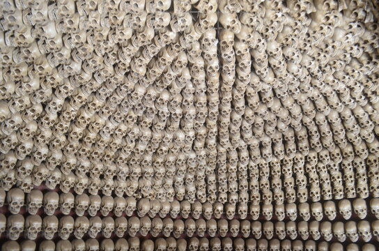 Wall of Human Skulls at a Sacred Indian Temple in Khajuraho, Symbolizing Death and Spiritual Ritual