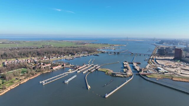 Orange sluices in Amsterdam harbor in Europe