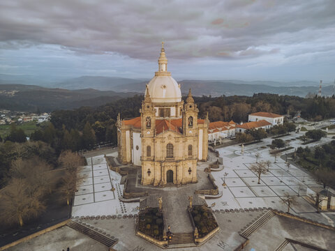 Aerial view of the Santuario de Nossa Senhora do Sameiro stands majestically against a backdrop of rolling hills, Braga, Braga, Portugal.