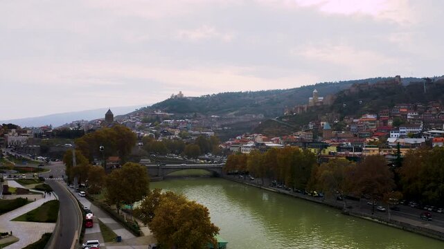 Tbilisi cityscape , modern architecture of Rike Park, and historic Old Town.