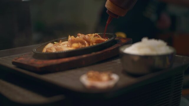 Korean street food sengseon gui grilled fish close view of delicious seafood dish in authentic Asian restaurant