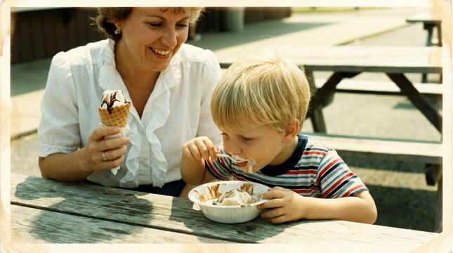A cheerful 1980s mother shares a sunny afternoon ice cream moment with her young children, captured in warm, nostalgic Kodak film
