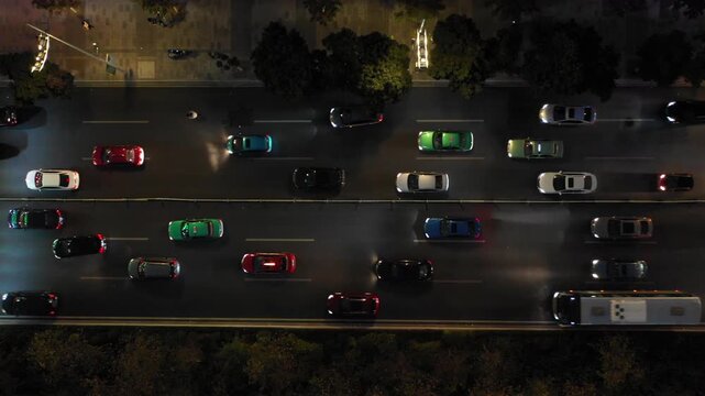 China transportation and infrastructure - Abstract aerial footage of cars driving over highway in central Guangzhou in the evening