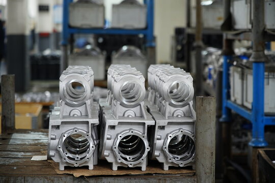 Scene of agricultural machinery components in factory workshop