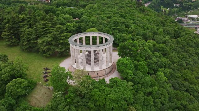 Aerial drone view of the Mausoleum of Cesare Battisti in Parco Naturale del Doss Trento, Italy.