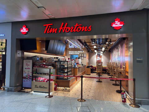 New Delhi, India - March 10, 2026: Empty Tim Hortons Outlet Closed for the Night at New Delhi Airport. Tim Hortons is a multinational coffeehouse and restaurant chain based in Canada.