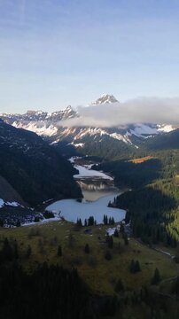 Obersee lake Oberseealp valley in the winter Switzerland vertical video reel