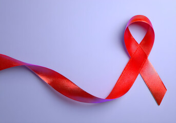 Red Awareness Ribbon on Soft Background Symbolizing HIV AIDS Awareness and Support
