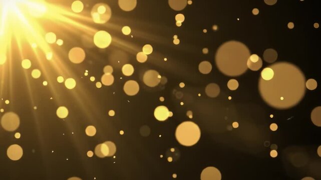 Golden light particles on dark background