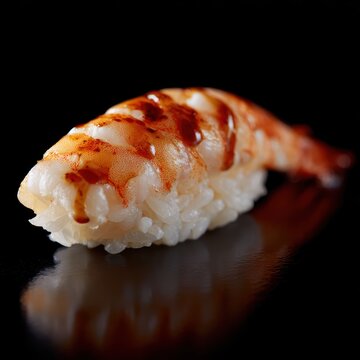 Isolated ebi nigiri sushi with shrimp and rice Japanese cuisine delicacy