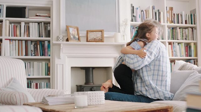 Smile, old man and child jumping in home with energy, playful fun and bonding together. Happy, grandfather or catching kid with support, visit grandparent and babysitting grandchild for weekend break