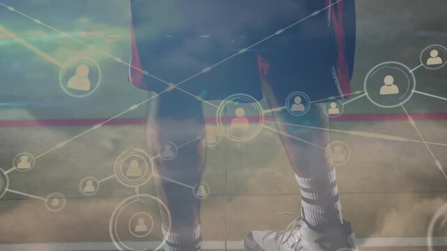 Animation of network of connections over basketball player and sky with clouds