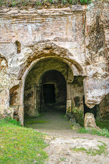 Naklejka premium The scenic views of the rock-hewn monastery of St. Nicholas, which is located along Papuç Stream, west of Kıyıköy (medieval Medea) on the Black Sea coast, Turkey. The complex includes a church carved 