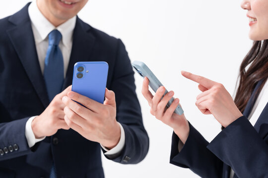 ビジネス　スマホ　男性　女性