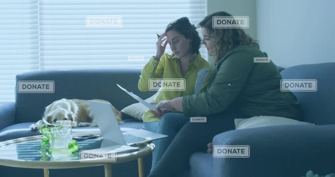 Animation of donate texts over caucasian female couple using laptop