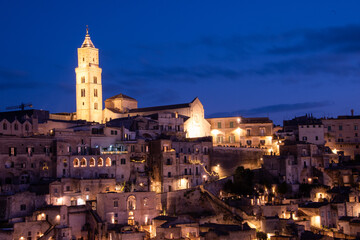 Fototapeta premium The Cathedral of Matera, Italy, rises above the Sassi, a Romanesque crown of stone watching over centuries of history.