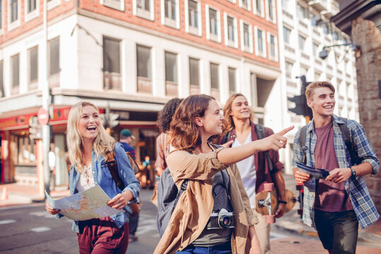 Group of friends sightseeing on a city street