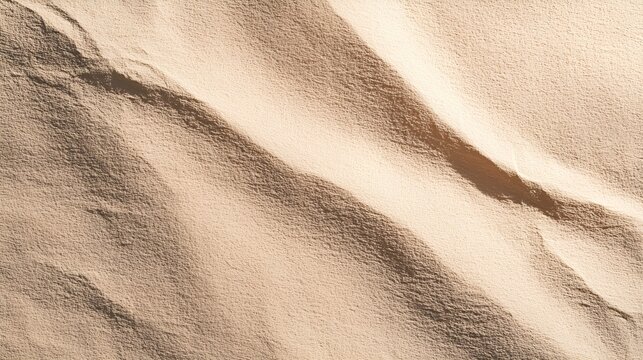 Desert sand forming intricate ripples and waves, showcasing beautiful natural texture and patterns with contrasting shadows creating depth and a serene minimalist background