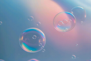 Naklejka premium Iridescent soap bubbles floating gracefully against a soft gradient background of pastel blue and purple light.