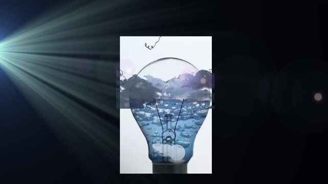Animation of light trails over clouds and light bulb on black background