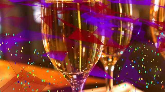 Animation of shapes and confetti over glasses of champagne