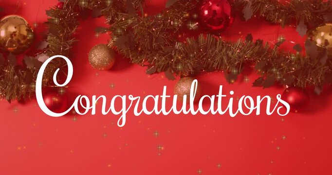 Animation of congratulations text over christmas decorations