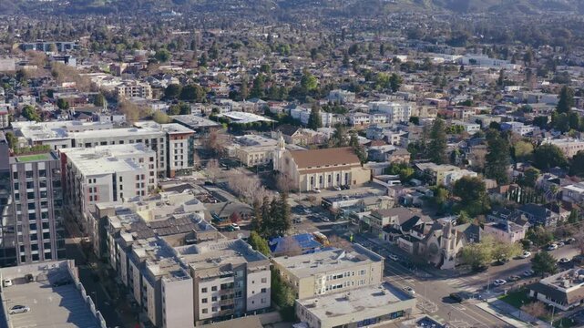 Oakland, California, a city with a church. Drone shot above the city.