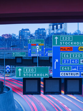 Road signs showing direction to Stockholm and Malm&ouml; from Gothenburg during evening hours