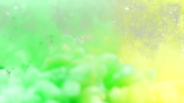 Green and yellow paint cloud spreading in water on a white background. Premium marketing concept for overlay effects, creative branding, banner and advertising layout design, ecology, beauty, and