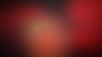 Fototapeta premium Dark red and black grainy gradient background with soft blurred light transitions and a subtle textured noise overlay for atmospheric depth