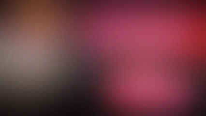 Obraz premium Grainy abstract background with soft blurred gradient transition from deep black to dark magenta and muted brown tones in a smooth texture