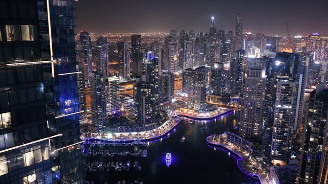 Urban skyline of Dubai Marina illuminated at night