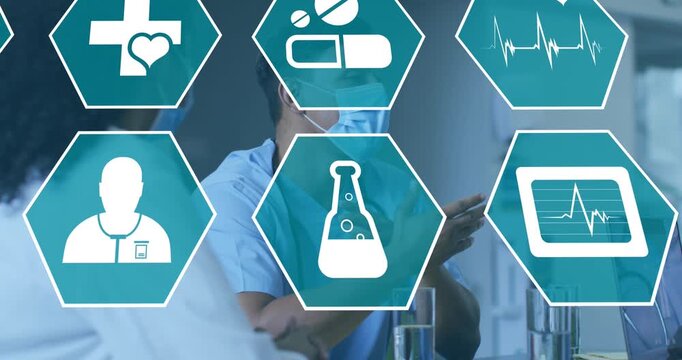 Animation of medical icons in hexagons over female and male doctors in face masks