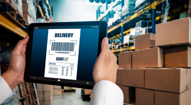 Warehouse management innovative software in computer for real time monitoring of goods package delivery . Computer screen showing smart inventory dashboard for storage and supply chain distribution .