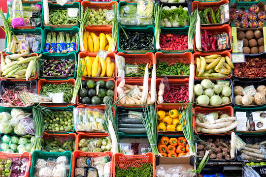 Lisbon, Portugal. Fresh vegetables in crates at market colorful produce display