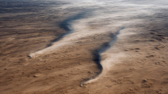 Dust devils spiraling over desert floor. Water crisis and water shortage in summer during long drought is a global problem of drought on the planet.
