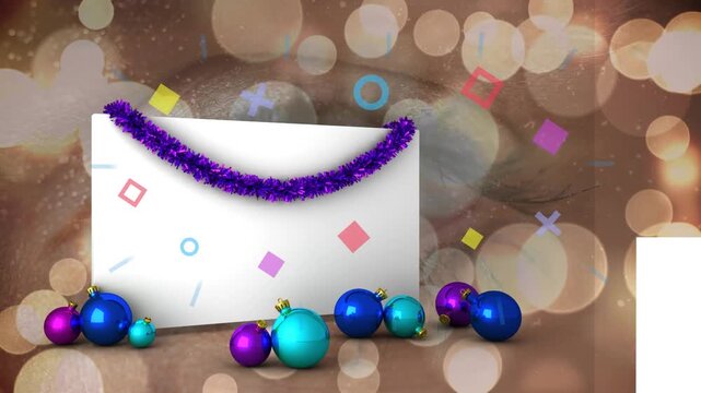 Animation of multicolored shapes over white box with garland, baubles on table and bokeh effect