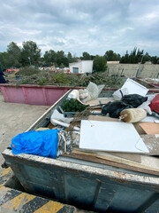 Obraz premium a container with mixed bulky waste at a recycling facility