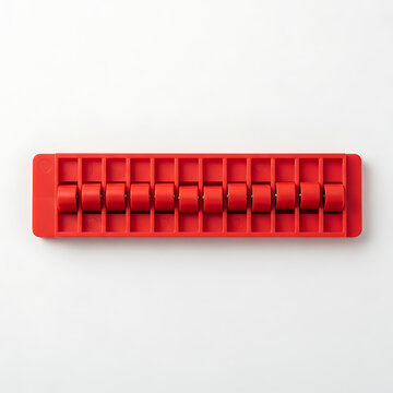 Vibrant red plastic strip with multiple small rollers for versatile applications