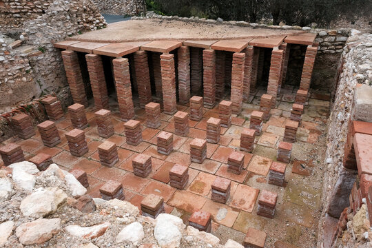 Remains of ancient Roman baths in Villa Romana dels Munts. Altafulla, Tarragona, Spain.