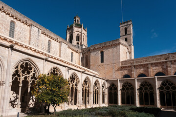 Obraz premium Cloister of Santa Maria de Santes Creus Monastery on sunny day. Tarragona Province, Spain.