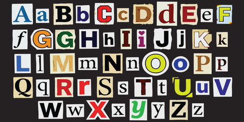 Alphabet set of cutout ransom note style letters on a black background design © ZenVectors