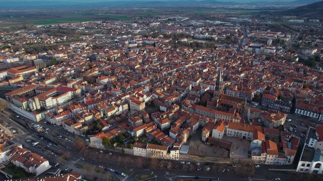 Aerial view around the old town of the city Riom, 63200 in France on a cloudy afternoon in early spring