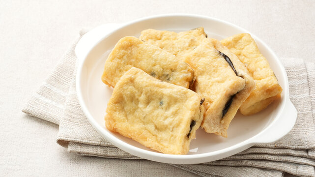 Tahu Petis, fried tofu filled with black shrimp paste. Indonesian food